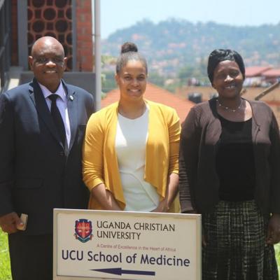 Deborah Mensah and Dr.Miriam Mutabazi, the two STM Directors pose for a photo with the dean of UCU School of Medicine.